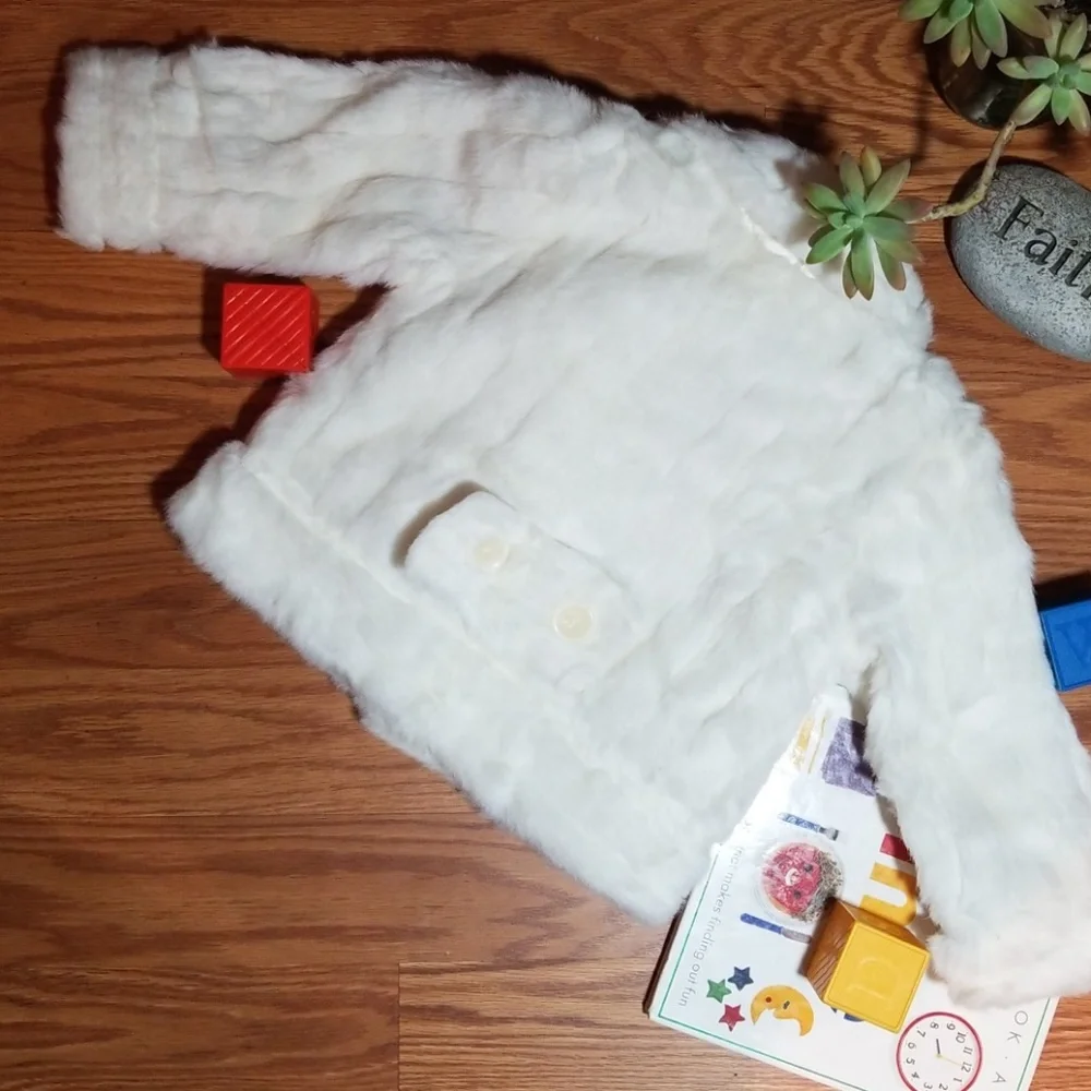 Winter white‎ fur jacket children place